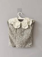 SWAN SLEEVELESS - LEAVES