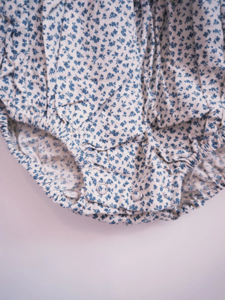 Organic Emilie Smocked Romper - cowslip floral in fog image 1 of 0