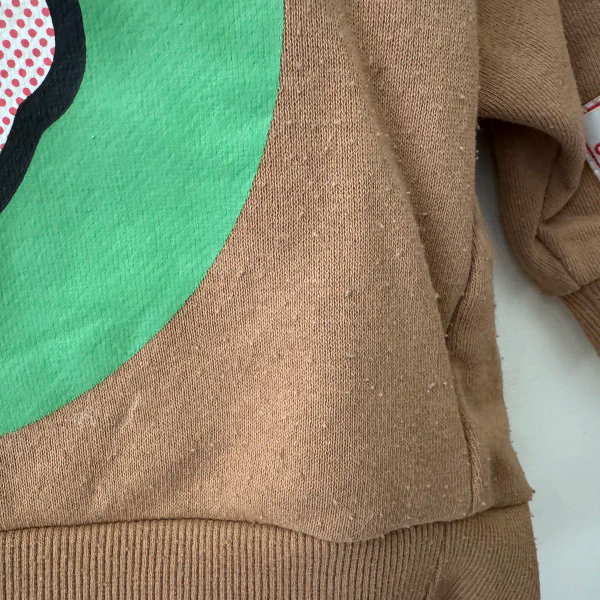 AW24 OSAMU GOODS聯名上衣 image 1 of 0