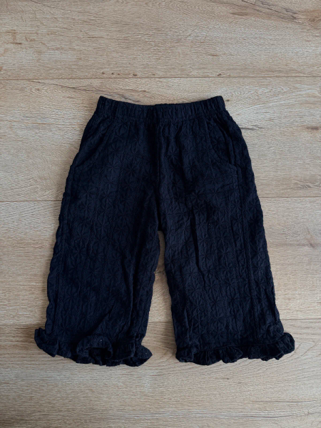 黑色刺繡鏤空荷葉邊長褲 image 1 of 0